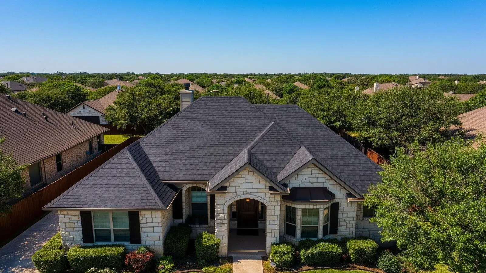 Premium Texas hill country home with new roof at golden hour